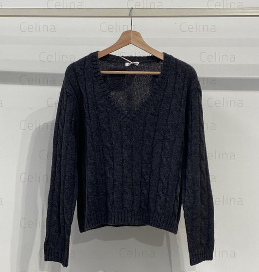 Jersey punto cuello pico detalle nudo